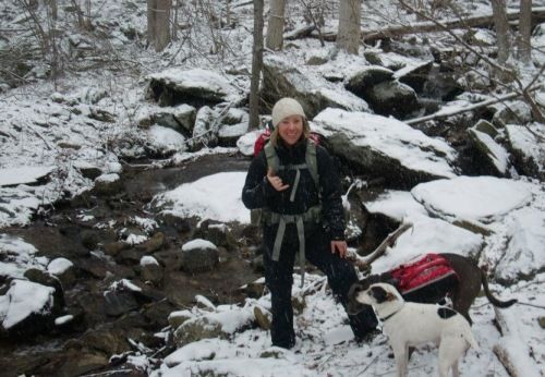 image of Tina in the woods in the winter